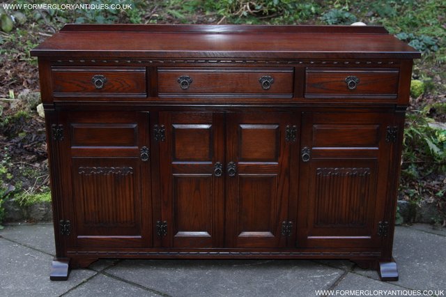 Preview of the first image of OLD CHARM TUDOR OAK SIDEBOARD DRESSER BASE CABINET TABLE.