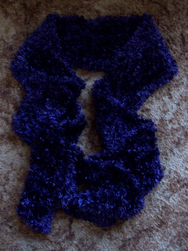 Preview of the first image of SHIMMERY PURPLE LONG PILE LONG SCARF.