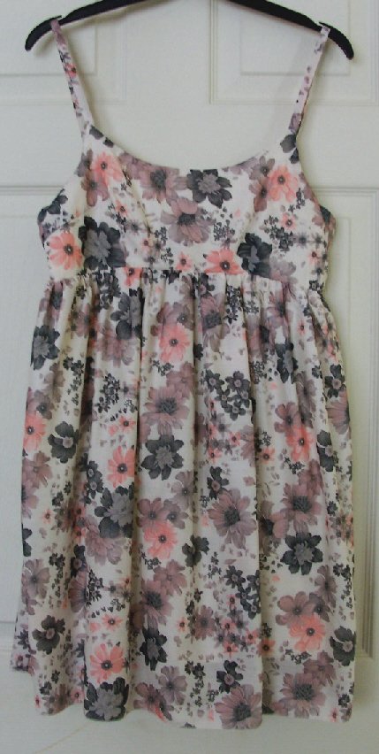Preview of the first image of PRETTY LADIES FLOWERED TOP/DRESS BY MISO - SZ 10 B18.