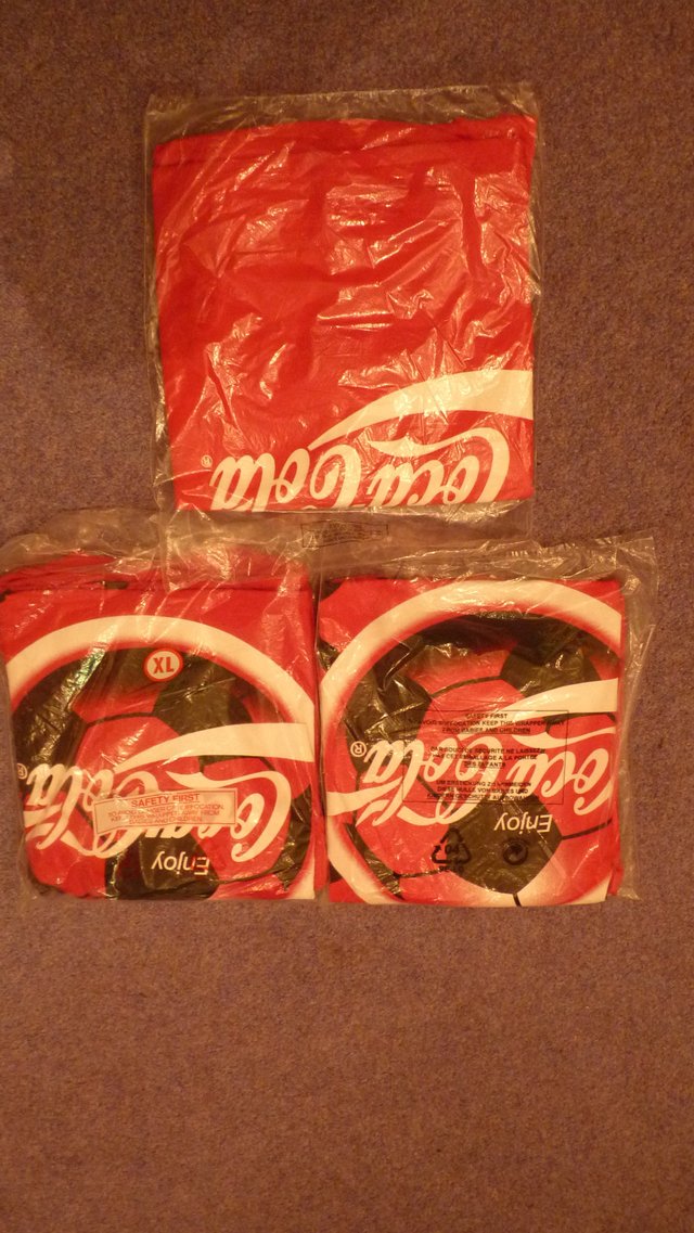 Image 2 of Three collectable  Coco Cola T shirts