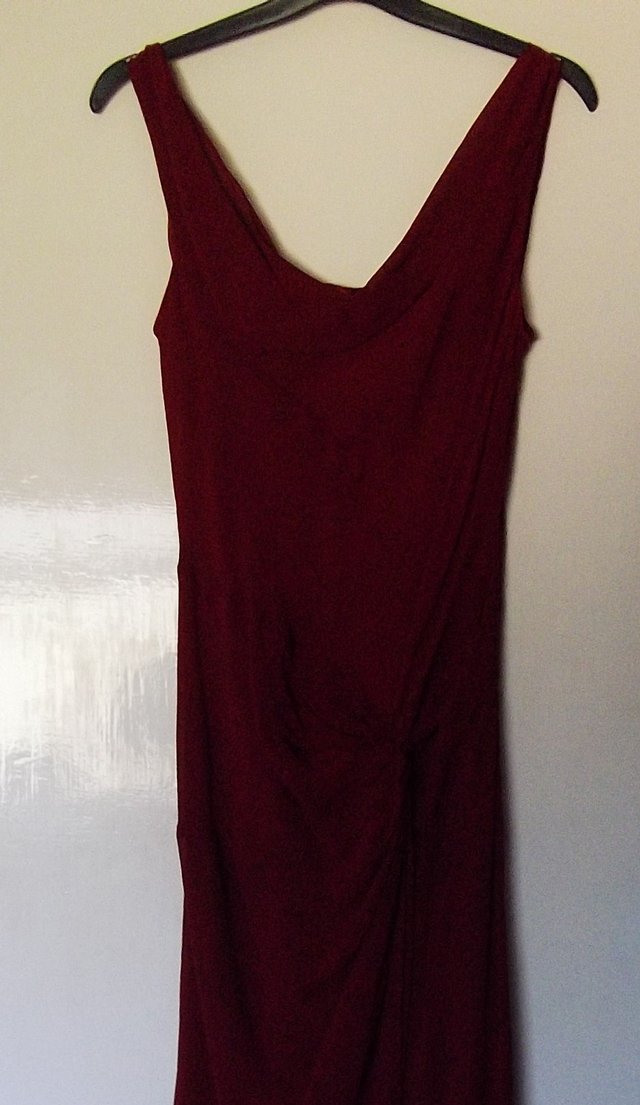 Preview of the first image of BURGUNDY EVENING/OCCASION DRESS SIZE 8.