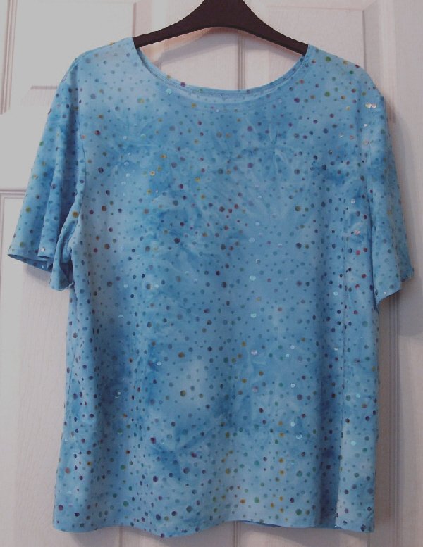 Preview of the first image of LADIES BLUE SHORT SLEEVE METALLIC TOP - SZ 22  B20.