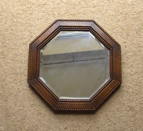 Preview of the first image of Antique 8 Sided Mirror - 15 inches wide.