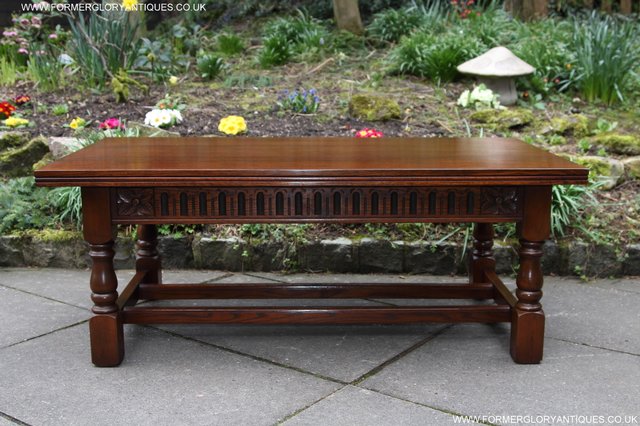 Preview of the first image of OLD CHARM CARVED TUDOR OAK LAMP COFFEE SOFA TEA TABLE STAND.