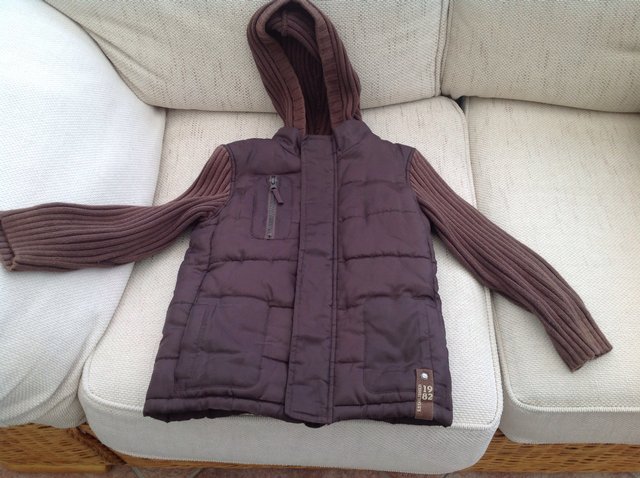 Preview of the first image of Boys Long Sleeve Body Warmer Aged 4-5 Years.