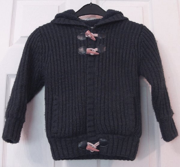 Preview of the first image of BOYS NAVY KNITTED CARDIGAN WITH FLEECE LINING - AGE 5/6 YRS.