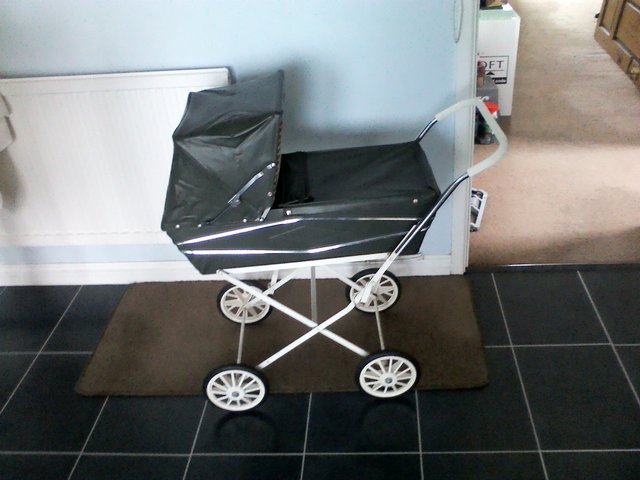 Preview of the first image of VINTAGE 1970s CHILD'S DOLL'S PRAM..