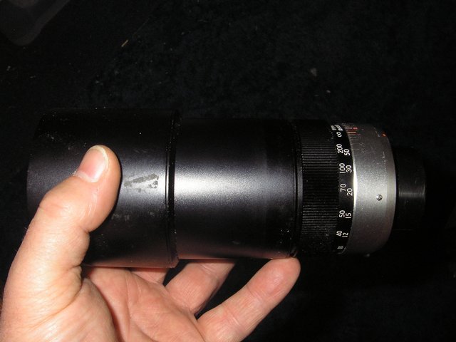 Preview of the first image of Telephoto 200mmTopcon camera lens.