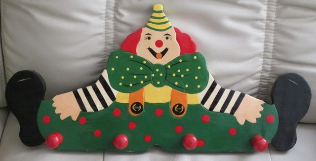 Preview of the first image of ' CLOWN ' design wooden clothes rack bright & colourful.