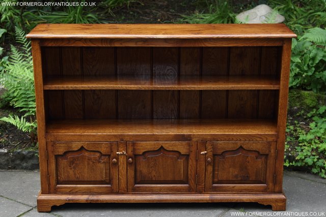 Preview of the first image of TITCHMARSH GOODWIN STYLE OAK OPEN BOOKCASE CD DVD CABINET.