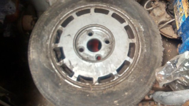 Preview of the first image of classic mini 12" alloy and good tyre.