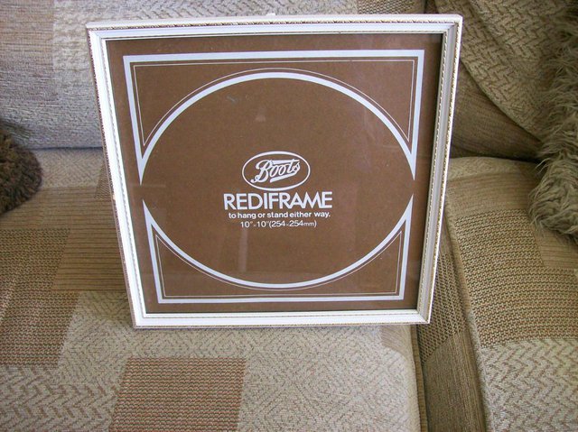 Preview of the first image of Picture frame White with gilt edge and "glass" ~ 10" by 10".