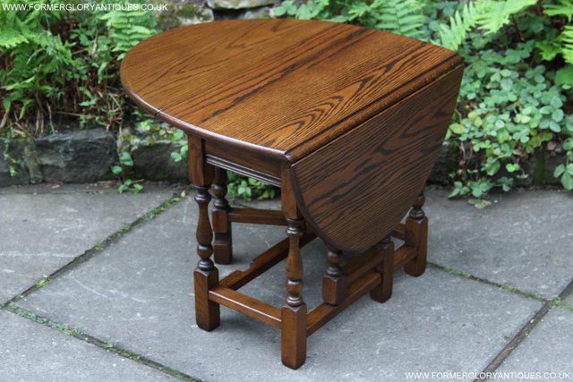Preview of the first image of OLD CHARM LIGHT OAK DROP-LEAF GATE-LEG COFFEE LAMP TABLE.