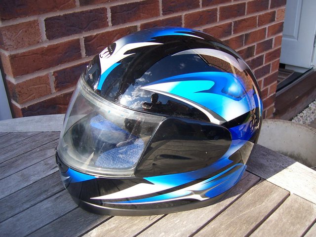 Preview of the first image of BLUE AND SILVER TAKAI MOTORCYCLE HELMET.