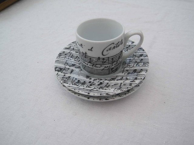 Preview of the first image of cup and 2 saucers with music pattern on.
