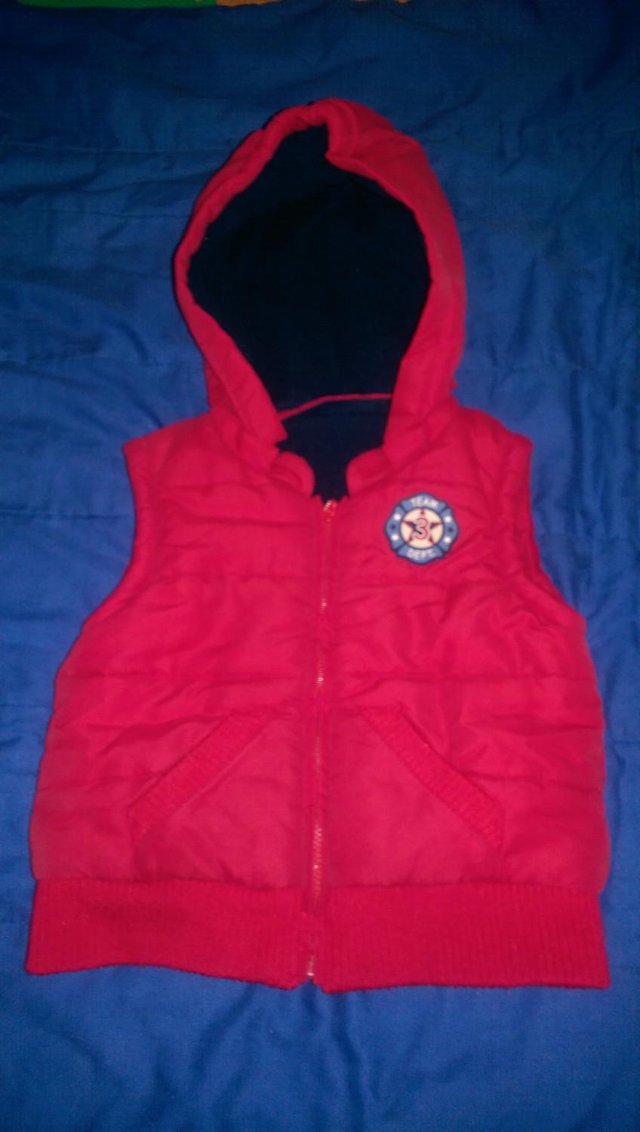 Preview of the first image of Boy's Red Gilet.
