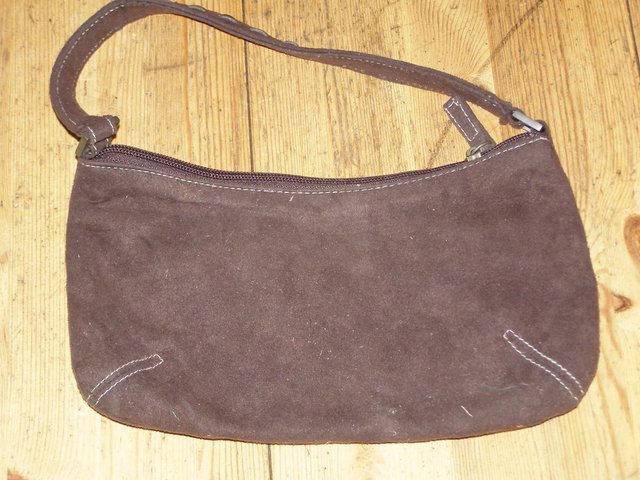 Preview of the first image of Principals Brown purse (Incl P&P).