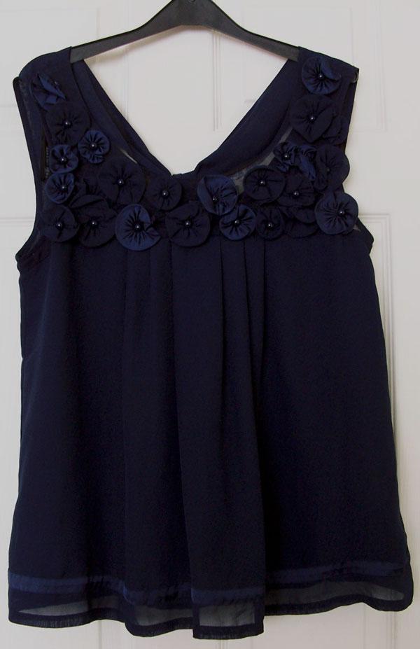 Preview of the first image of LADIES NAVY SLEEVELESS BLOUSE BY DOROTHY PERKINS - SZ 12 B9.
