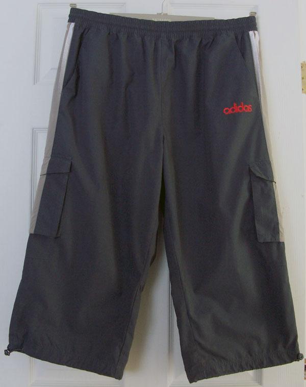 Preview of the first image of MENS DARK GREY/BROWN CROP TROUSERS BY ADIDAS - SZ XL B13.