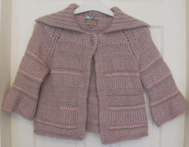 Preview of the first image of PRETTY SHORT STYLE CARDIGAN BY NEXT COUTURE - SZ 10 B13.