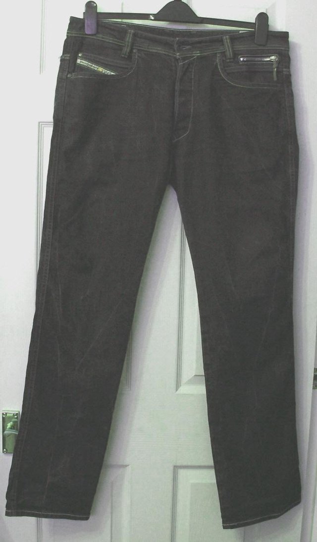 Preview of the first image of MENS GREY DISTRESSED LOOK JEANS BY DIESEL - SZ 36W/34L  B21.