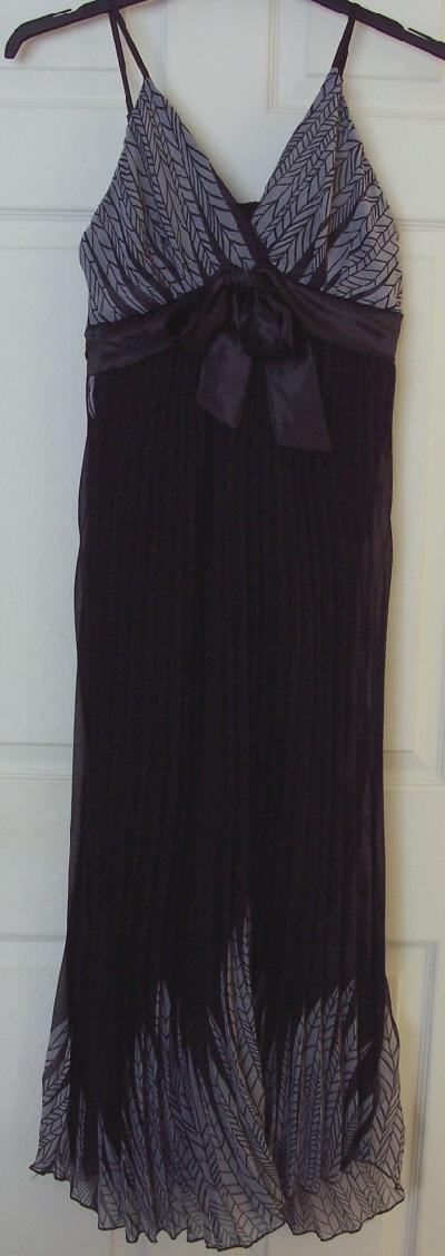 Preview of the first image of Ladies stylish long black/grey pleated dress  B24.