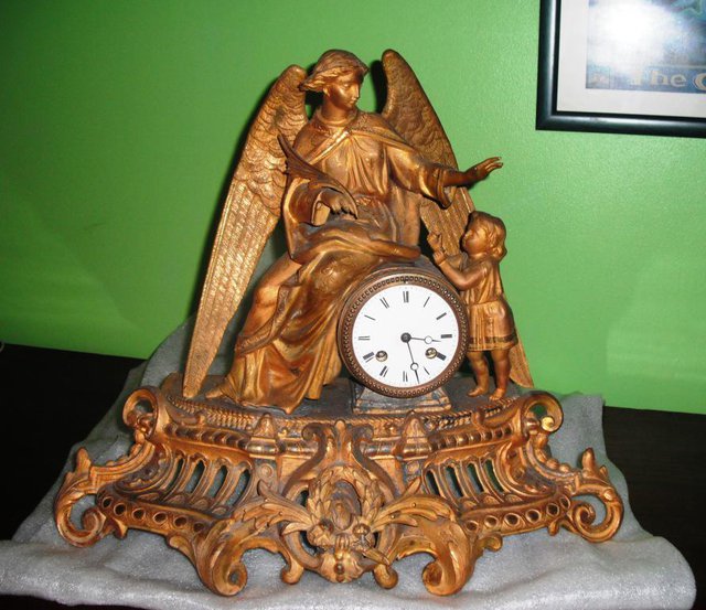 Preview of the first image of Mechanical Gold Spelter Clock.