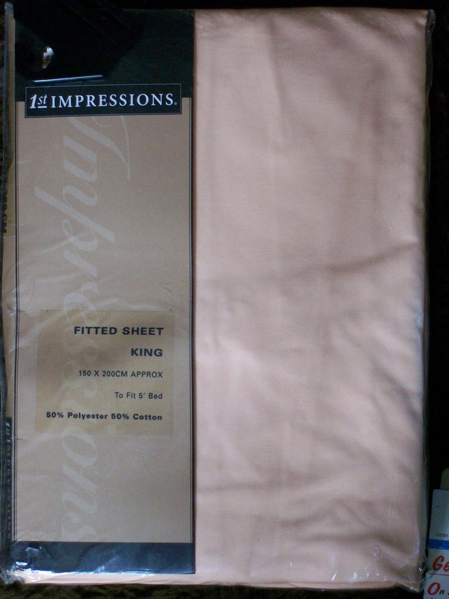 Preview of the first image of Kingsize 5'Fitted Sheet Apricot Peach Colour - New.