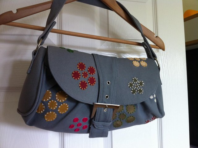 Preview of the first image of Earth Squared fair trade grey shoulder bag with appliqué.