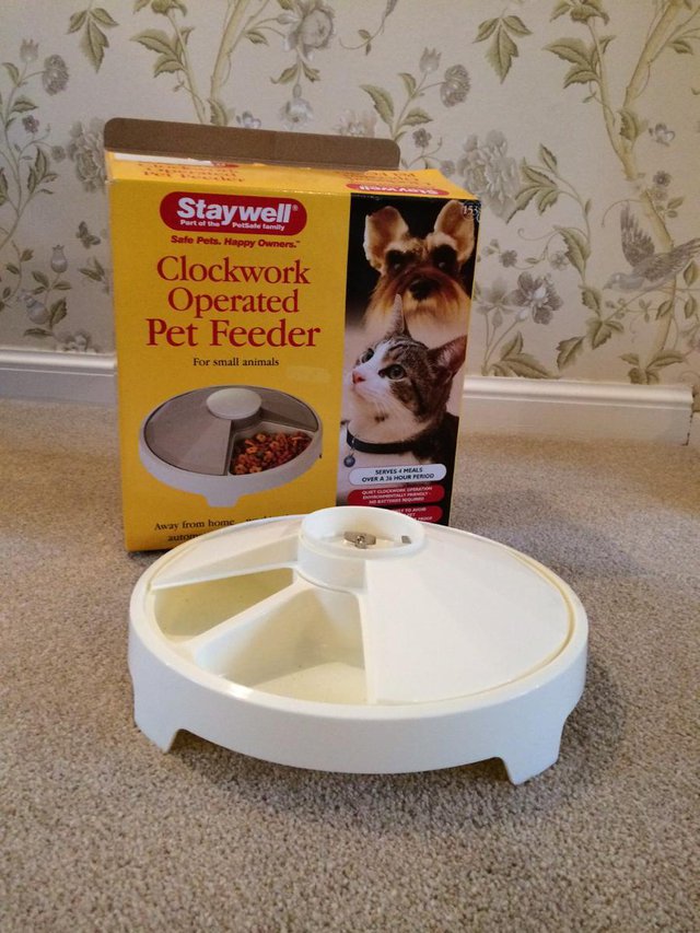 Preview of the first image of cat feeder . . . . . . . . . ..