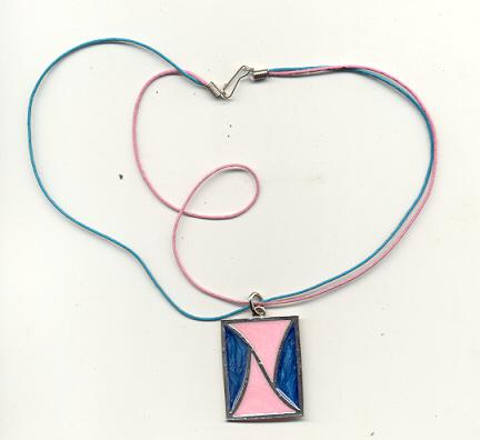 Preview of the first image of PINK & BLUE OBLONG SILVER FINISH PENDANT ON ROPE **VGC**.