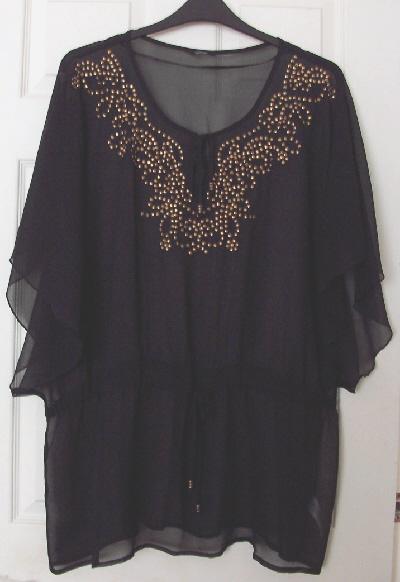 Preview of the first image of Pretty ladies black sheer batwing top by George - sz xs  B24.