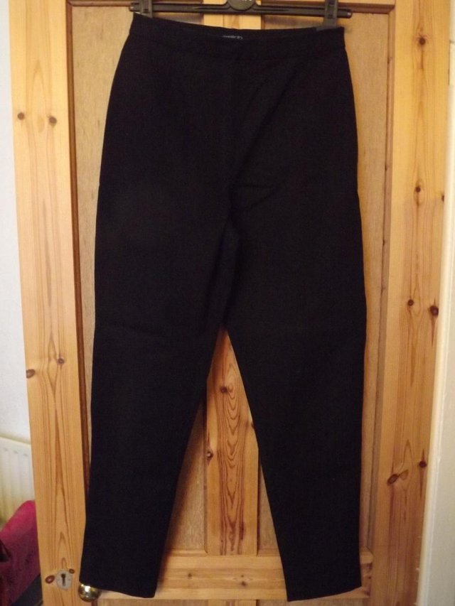 Preview of the first image of GAP Stretch black trousers.