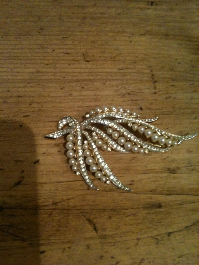 Preview of the first image of collectable rare triffari brooch.