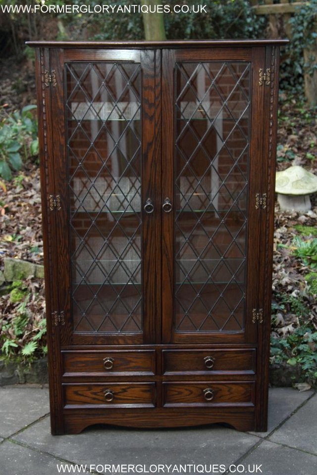Preview of the first image of JAYCEE OLD CHARM OAK DISPLAY CHINA CABINET CUPBOARD STAND.