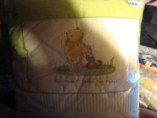 Preview of the first image of winnie the pooh Cot bumper brand new..
