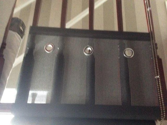 Image 2 of Black mesh and chrome eyelet roller blinds x 2