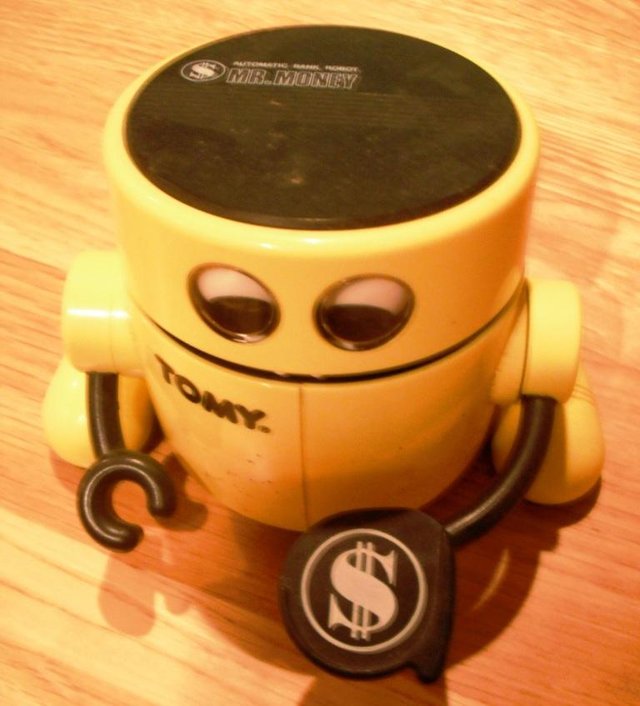 Preview of the first image of Tomy Mr Money Automatic Bank Robot Moneybox.