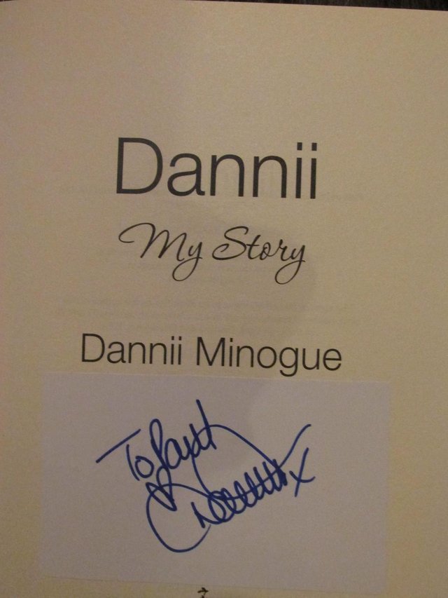 Preview of the first image of DANNII MINOGUE HAND  SIGNED BOOK.