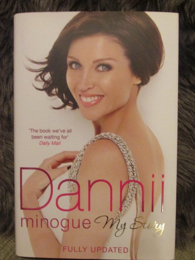 Preview of the first image of DANNII MINOGUE HAND  SIGNED BOOK.