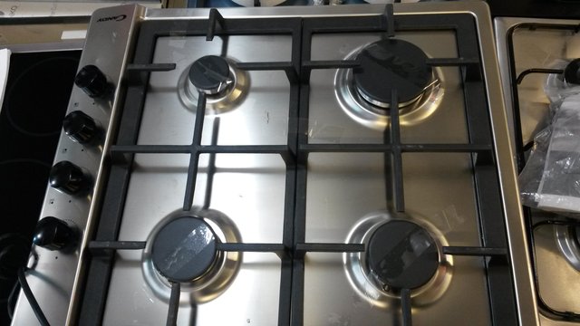 Preview of the first image of CANDY 4 BURNER CAST IRON GAS HOB NEW EX DISPLAY.