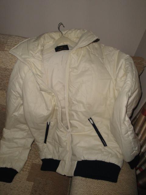 Preview of the first image of Thickly padded off-white/cream coat/ jacket - new.