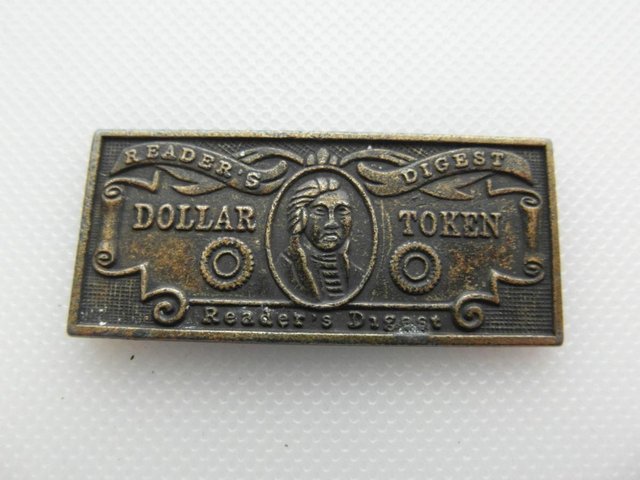 Preview of the first image of Promotional Reader's Digest Double Sided Dollar Token.
