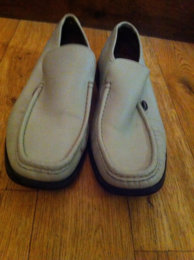 Preview of the first image of Size 8 Mens cream loafers by Base.