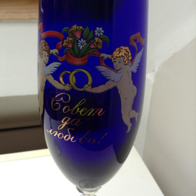 Preview of the first image of 6 x blue glass and clear glass wine flutes.