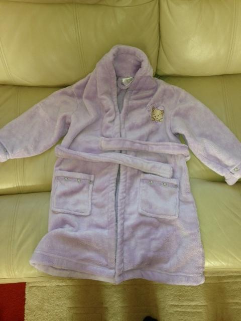 Preview of the first image of Girls dressing gown, age 3-4 years.