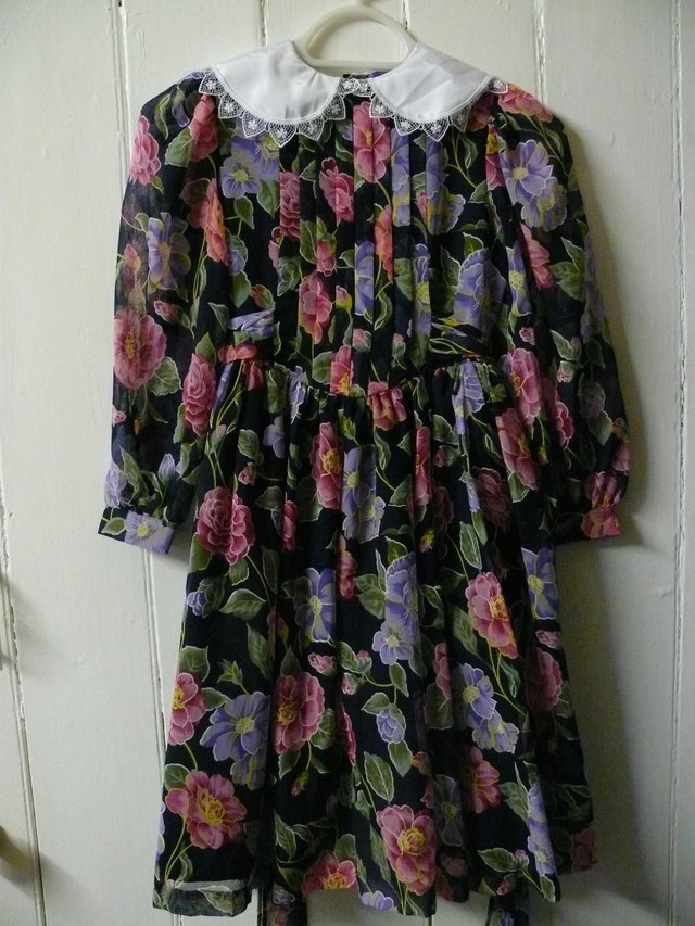 Preview of the first image of Special Occasions - Floral Dress Age 9.
