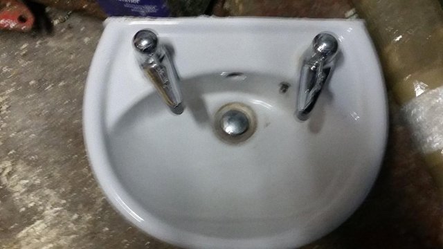 Preview of the first image of Small basin Inc taps...small basin Inc taps and waste.