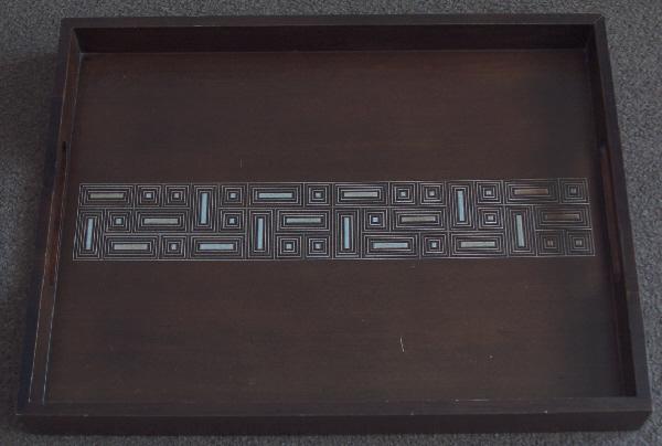 Preview of the first image of Beautiful dark wooden decorative tray with inlay design.