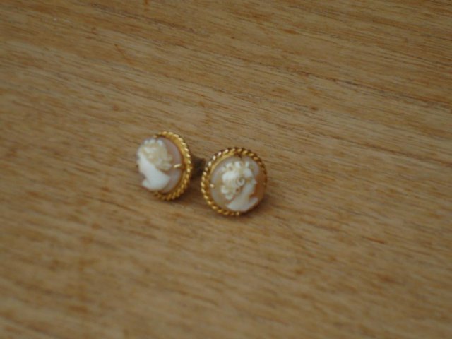 Preview of the first image of Gold cameo earrings.